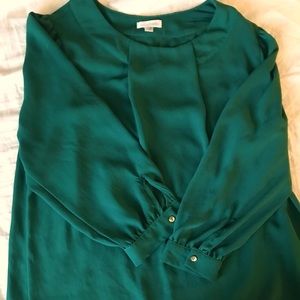 Green blouse with gold detail